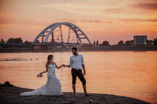 cityscape groom harbor sunset bride ocean sea water beach