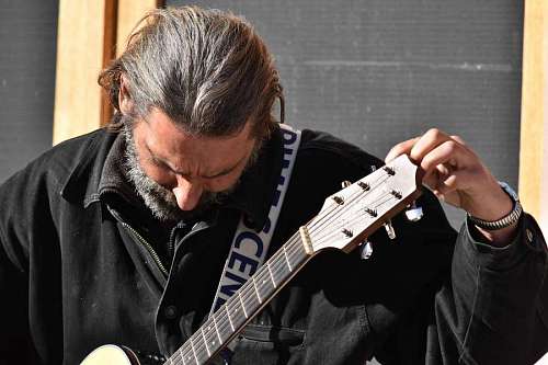 singer entertainer beard singer performer street guitarist acoustic portrait  play