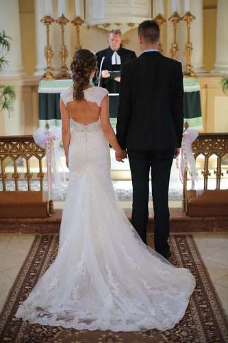 priest priest cathedral catholic ceremony groom marriage bride woman