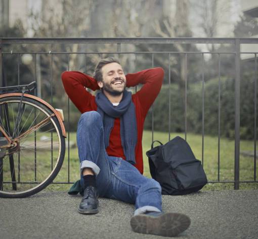 jumper relaxed  man  smile  happy  relax  bike  sitting