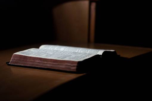 bible book  bible  reading  table  dark  room
