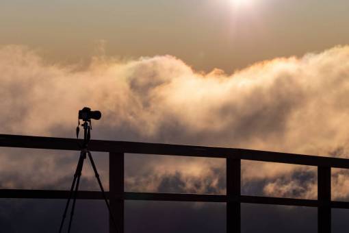 camera  silhouette  sky  tripod  clouds  sun  photographer