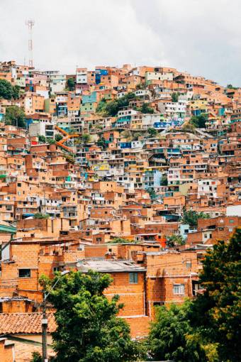 car Colorful Street View in a Popular Neighborhood of Medell?n, Colombia