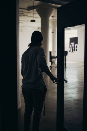 inside-of people  man  guy  door  inside  studio  dark
