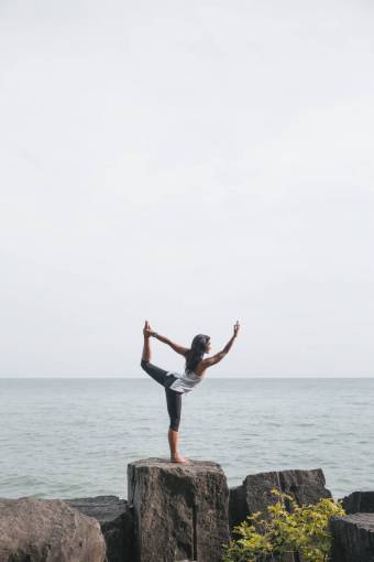 zen yoga  stretch  ocean  water  seaside  sky  rocks