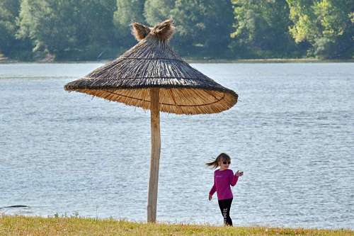 beach ocean parasol childhood grass spring pretty sunglasses sea water