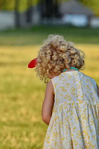 blonde hair park curl hairstyle pretty childhood child happy summer