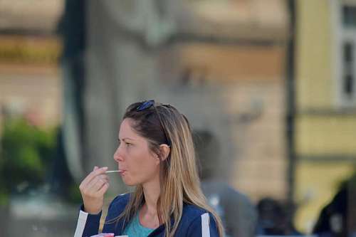 businesswoman dessert eating blonde sunglasses gorgeous pretty