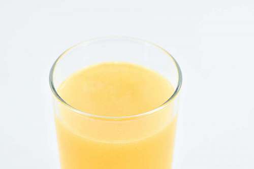 syrup cocktails beverage close breakfast syrup cold liquid glass drink yellow