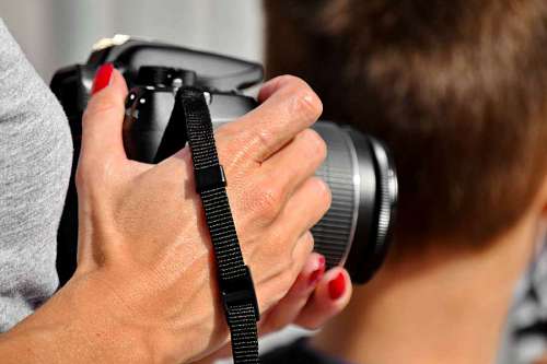finger hand woman professional lens photographer equipment kb