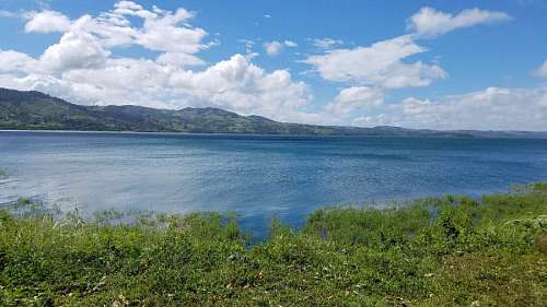 majestic nature lakeside water summer fair weather shore landscape lake beach
