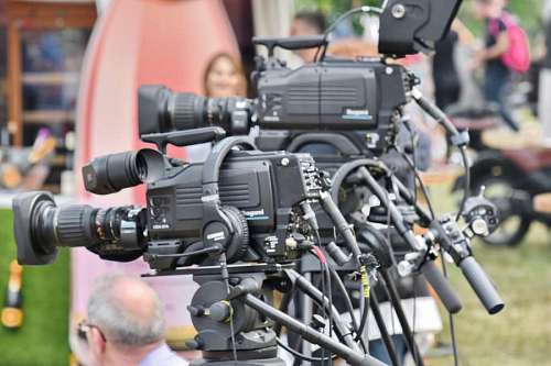tripod recording journalism lens camcorder tripod crowd equipment electronics technology  camera