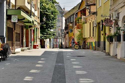 sidewalk street pavement urban town intersection road architecture 