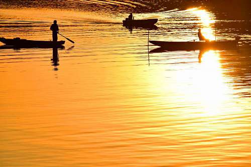 agua silueta sol sombra puesta de sol lago reflexión pescador barcos amanecer kb