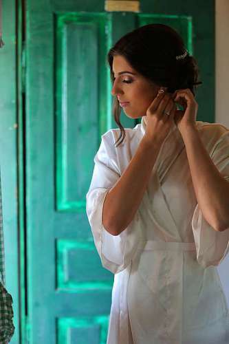 wife wife indoors domestic hairstyle earrings makeup portrait woman 