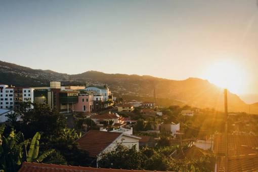 household sunset  building  establishment  architecture  sun  mountain  households