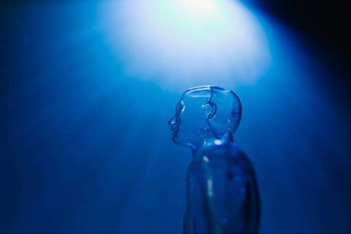 bottled close-up backgrounds glass face liquid blue water