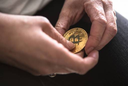 coin currency coin banking bitcoin human hand finance close-up