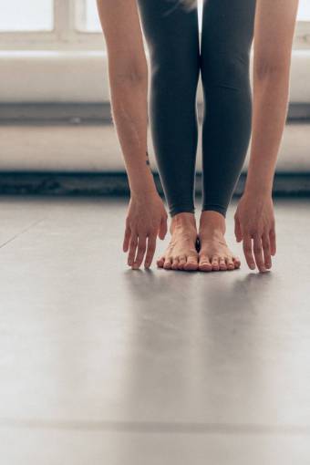 leg indoors human leg exercising sport women adult stretching