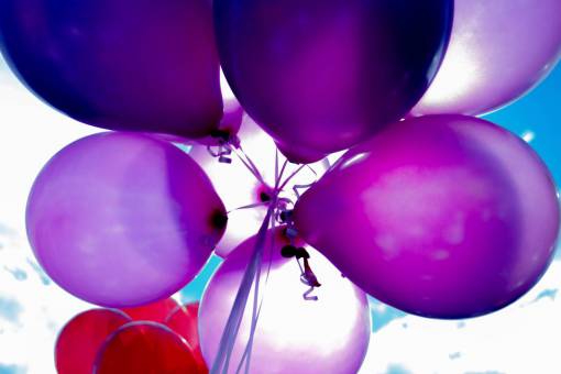 social-issues blue helium birthday celebration balloon purple;balloons multi colored