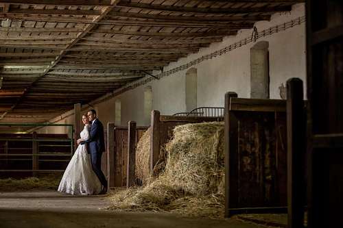 wife indoors ranch barn husband wife inside farmhouse bride