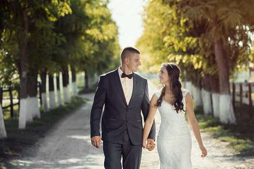 newlywed marriage walking newlyweds togetherness bride road groom outdoors person 