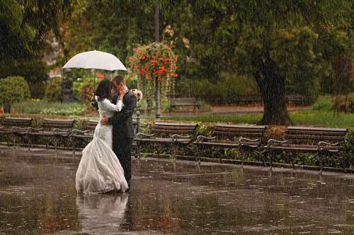 enjoying-life pretty street enjoying groom happiness bride umbrella rain