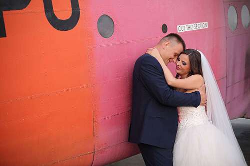 wife wife husband airplane embrace pilot boyfriend biplane hugging bride