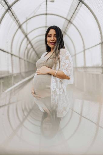 Portrait of a pregnant woman looking at camera