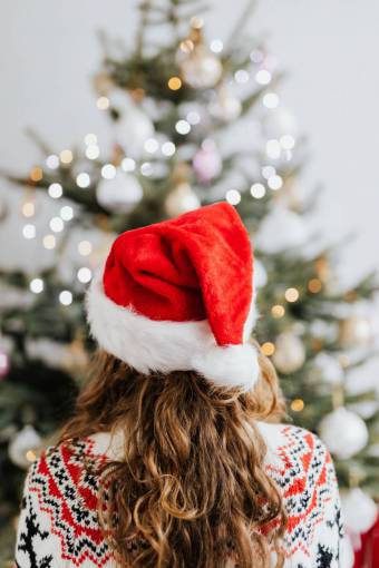 xmas Woman decorating christmas tree
