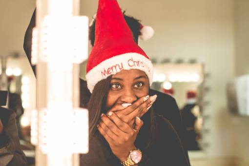 xmas Woman surprised with christmas gift