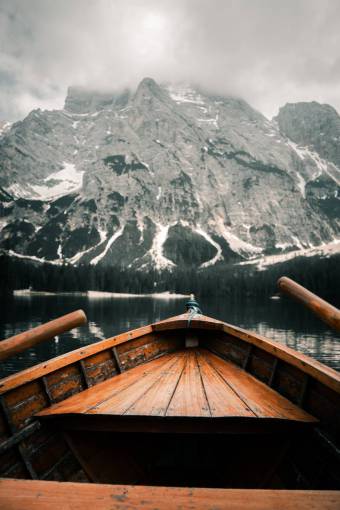 Wooden boat at a mountain lake