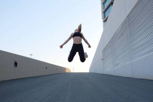 jogging fitness  woman  jumping  street  road  lycra  healthy