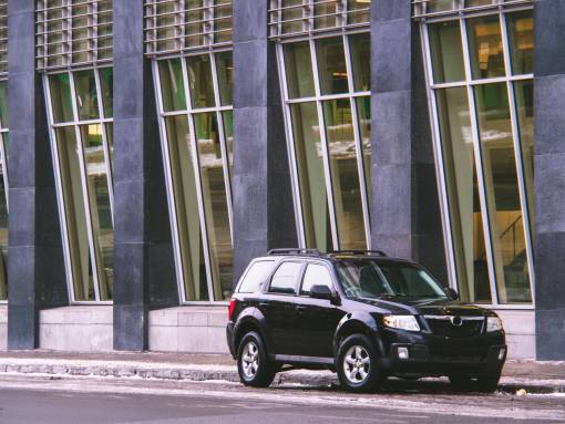 headlights parked  car  street  city  building  auto  suv
