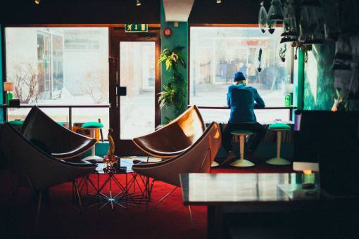 carpet-of-leaves restaurant  window  glass  chair  table  people  woman