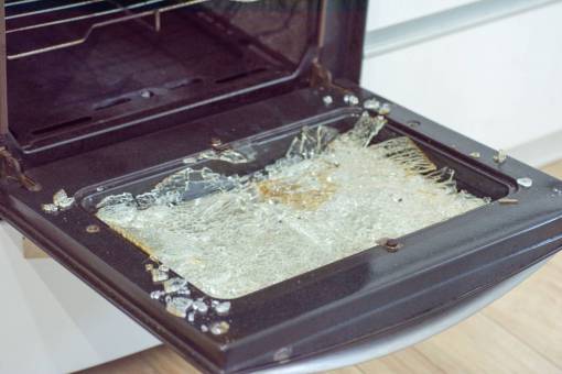 main Kitchen oven lid with shattered glass. Domestic accident