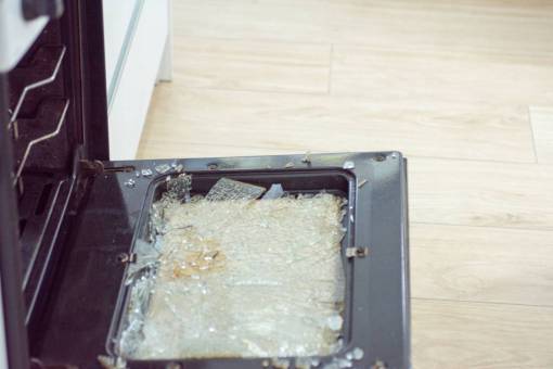main Kitchen oven lid with shattered glass. Domestic accident