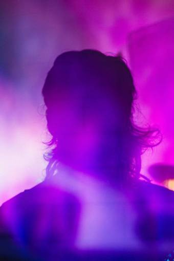 silhouette Silhouette of a man with purple light