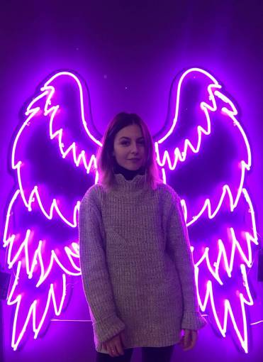 neon-lighting Woman with purple neon wings