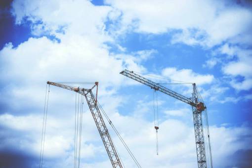 crane-machinery blue  sky  clouds  crane  construction
