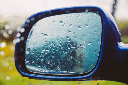 rainy mirror  window  raining  wet  rain drops  car  automotive
