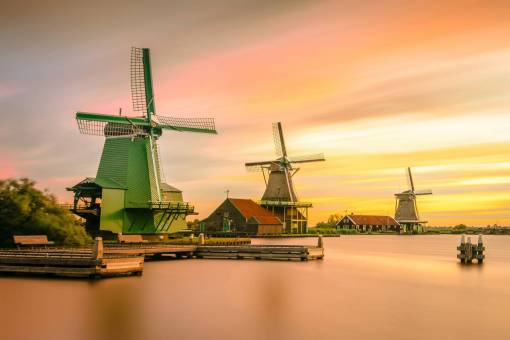 windmill nature  water  ocean  houses  windmills  sky  clouds