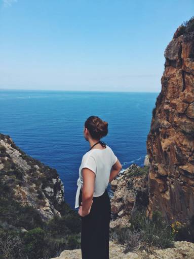 woman  girl  lady  people  back  stand  cliff