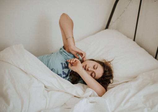 pillow bed bedroom lifestyles indoors woman;wake up one person