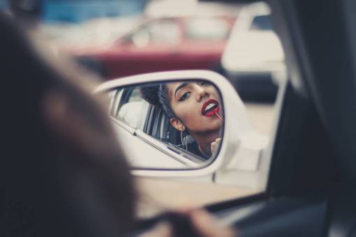 rear-view woman;rear view mirror beauty young adult driving adult car women