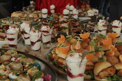 banquet banquet appetizer buffet baked goods cream fruit dinner plate 