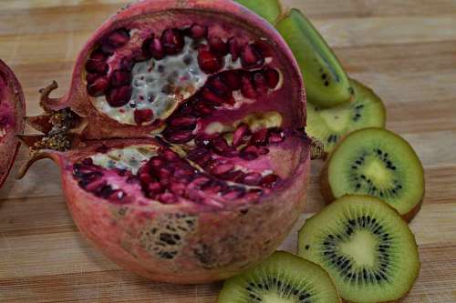 bitter bitter kiwi organic delicious ripe pomegranate produce seed diet fruit