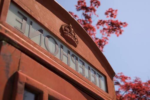 england red  telephone  box  london  england  blue  sky