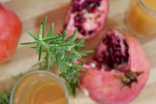 pomegranate antioxidant rosemary garnish pomegranate branch delicious spice meal dinner 