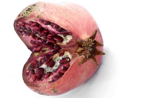 pomegranate section cross kernel fruit side ripe meal close exotic tropical vegan 